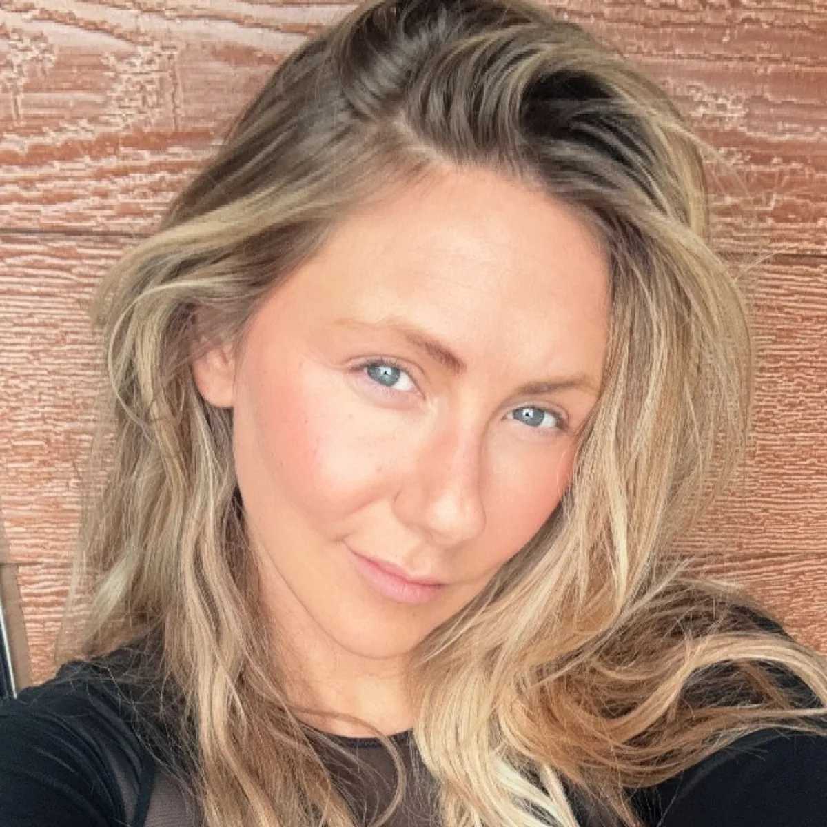 Soft, low-resolution selfie crop — the original
